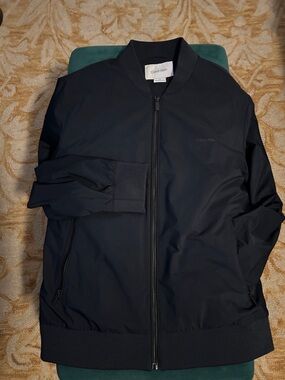 CALVIN KLEIN satin lined black bomber jacket. Size Large double inside pocket